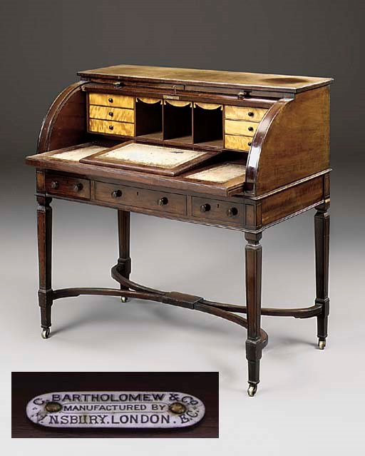 A LATE VICTORIAN MAHOGANY CYLINDER DESK
