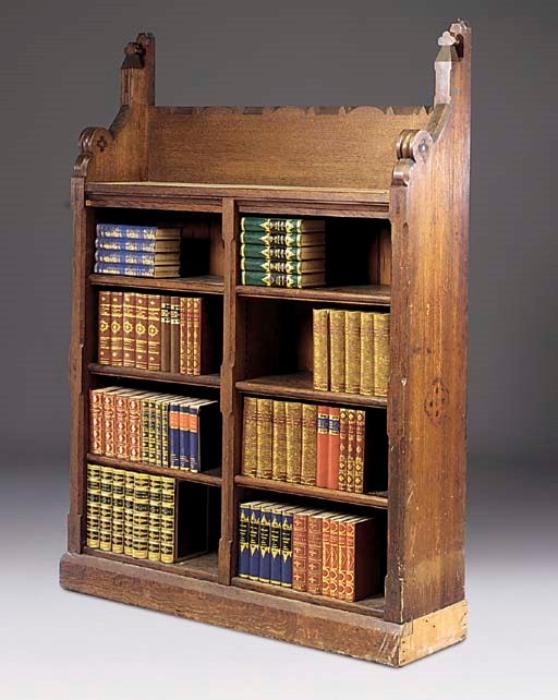 A VICTORIAN OAK AND OAK INLAID OPEN-FRONT BOOKCASE