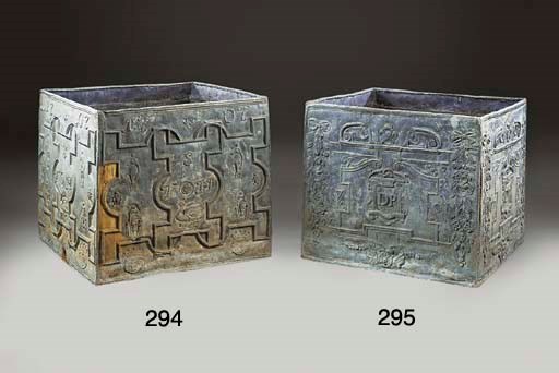 A LARGE lead cistern or planter