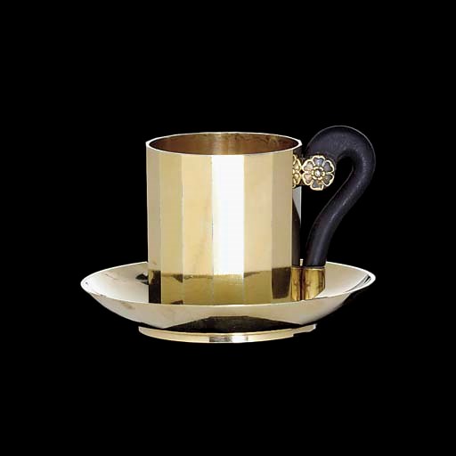 A FRENCH SILVER-GILT CUP AND SAUCER