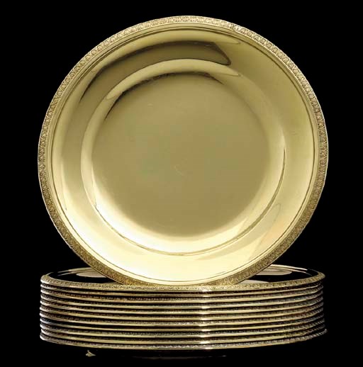 A SET OF TWELVE FRENCH SILVER-GILT PLATES