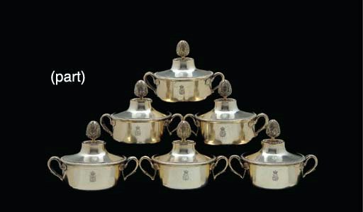 A SET OF SIX FRENCH SILVER-GILT TWO-HANDLED BOWLS AND COVERS