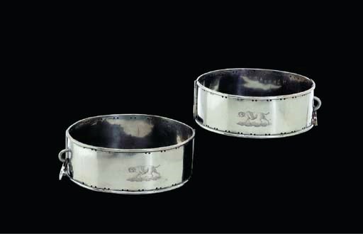 A PAIR OF SILVER-PLATED DOG COLLARS