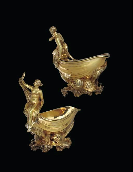 A PAIR OF GEORGE IV SILVER-GILT SAUCE BOATS