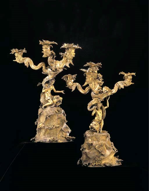 A PAIR OF REGENCY SILVER-GILT FOUR-LIGHT CANDELABRA