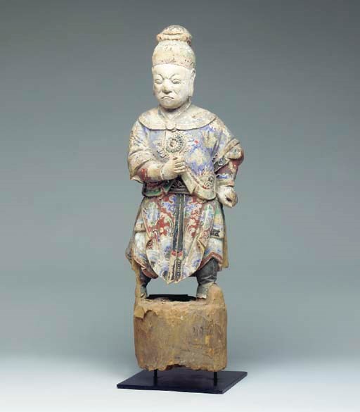 A PAINTED WOOD FIGURE OF A GUARDIAN,
