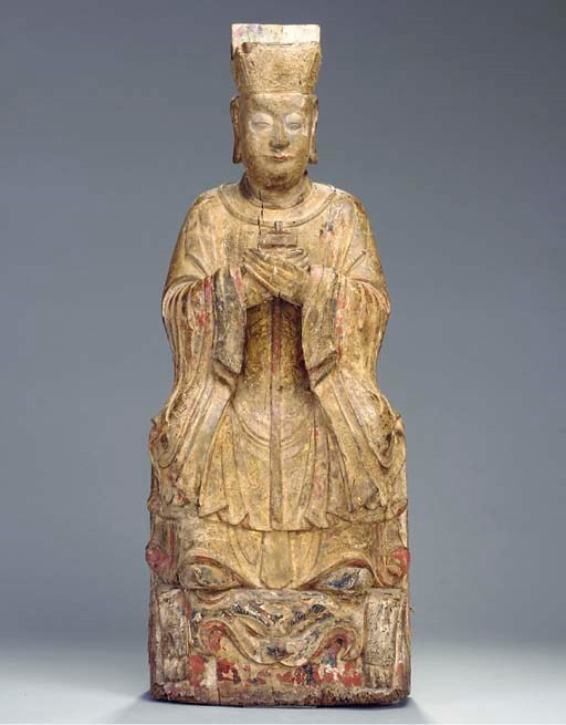 A LACQUERED AND GILT-WOOD SCULPTURE OF AN OFFICIAL,