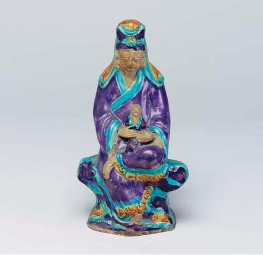 TWO POLYCHROME-GLAZED POTTERY FIGURES OF GUANYINS,