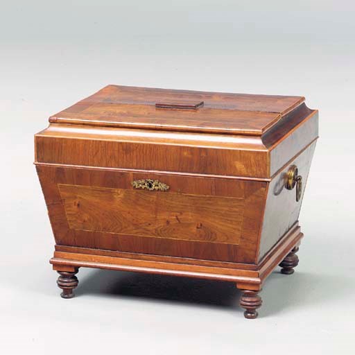 A VICTORIAN MAHOGANY SARCOPHAGUS FORM CELARETTE,