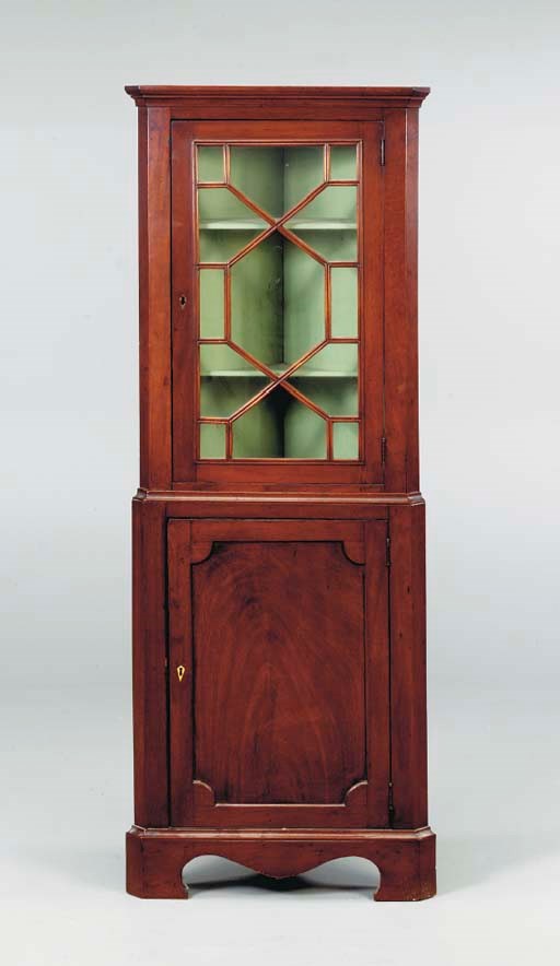 A GEORGE III STYLE MAHOGANY CORNER CUPBOARD,