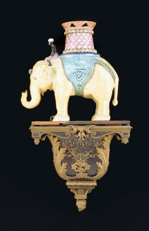 A PORCELAIN EXPORT FIGURE OF AN ELEPHANT ON A BOULLE MARQUETRY AND GILT BRONZE WALL BRACKET,