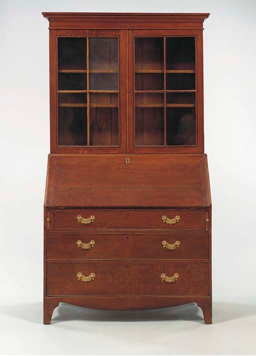 A PROVINCIAL GEORGE III OAK SECRETAIRE BOOKCASE,