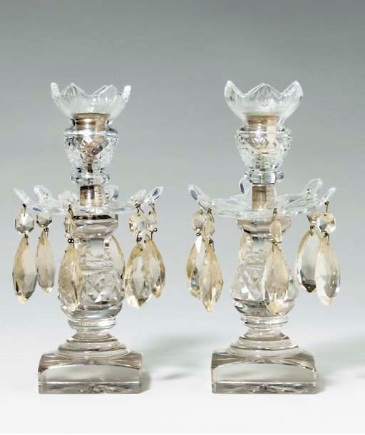 A PAIR OF GEORGE III STYLE CUT GLASS CANDLESTICKS,