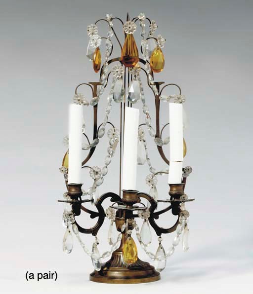 A PAIR OF LOUIS XVI STYLE GILT-BRONZE CLEAR AND AMBER GLASS THREE LIGHT CANDELABRA,