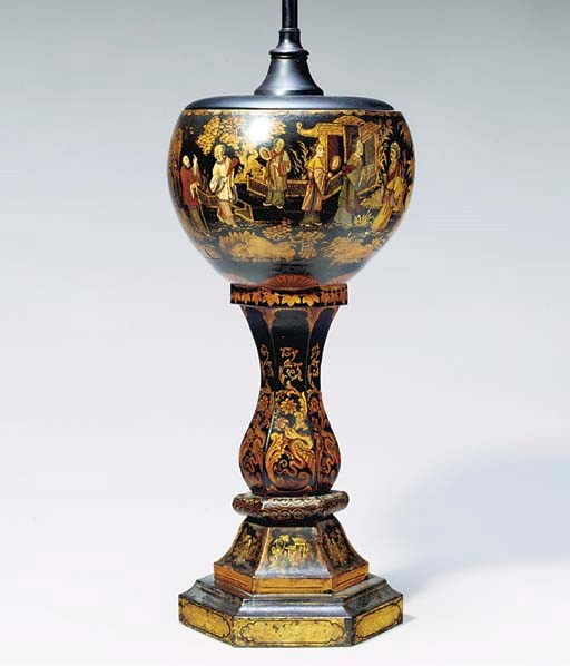 A TOLE PIENTE VESSEL MOUNTED AS A LAMP
