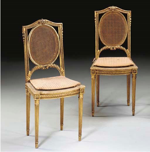 A pair of Napoleon III giltwood chaises,