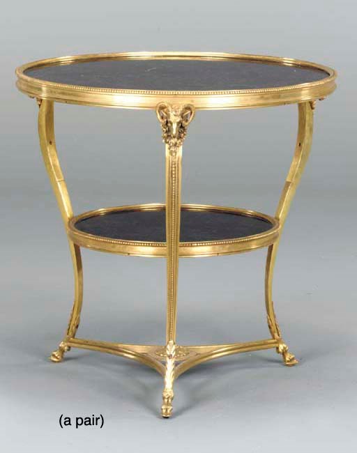 A PAIR OF LOUIS XVI STYLE GILT BRONZE AND FOSSIL MARBLE GUERIDONS,