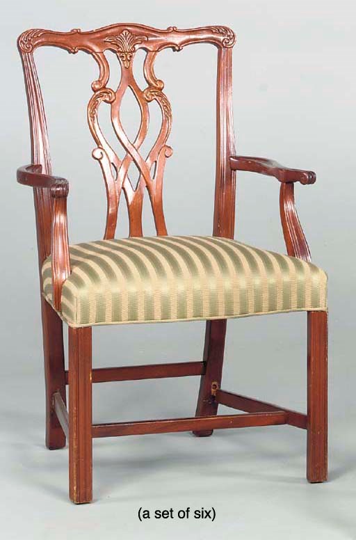 A SET OF SIX GEORGE III STYLE CARVED MAHOGANY DINING CHAIRS,
