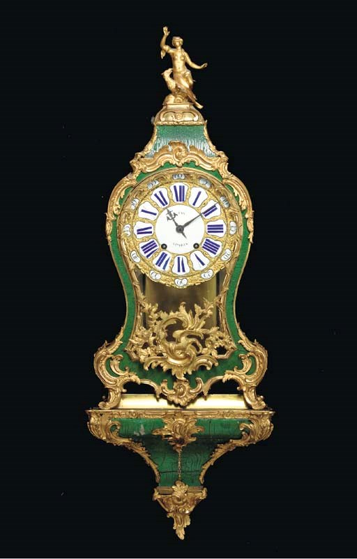 A REGENCE STYLE GREEN LACQUERED AND GILT BRONZE MOUNTED CARTEL CLOCK,