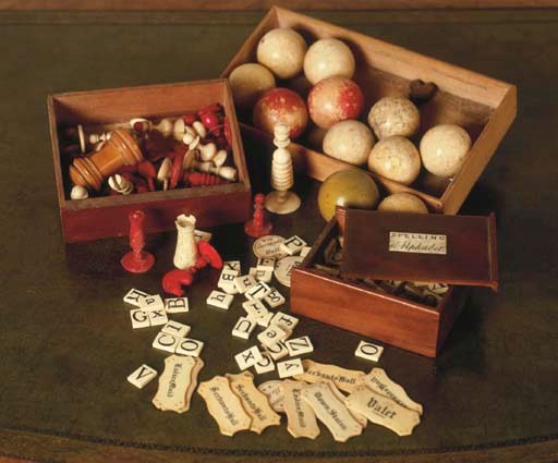 A VICTORIAN IVORY AND MAHOGANY SPELLING SET
