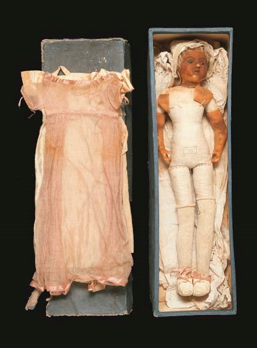 AN EARLY BEESWAX SHOULDER-HEAD CHILD DOLL