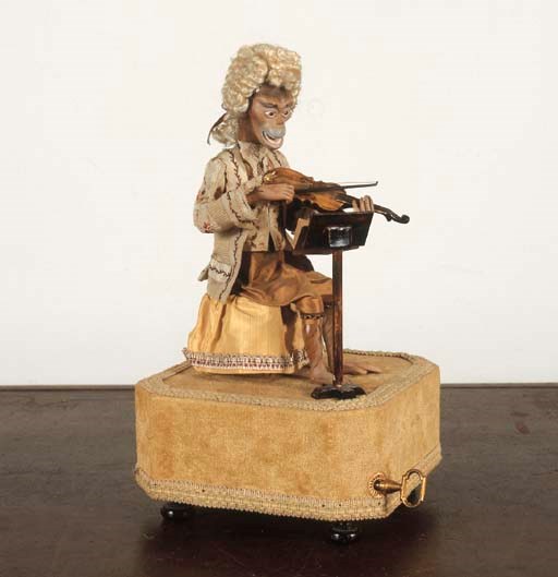 A FRENCH REUGE MONKEY MUSICIAN AUTOMATON