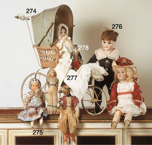 AN AUSTRIAN COMPOSITION-HEADED PINPERLE DOLL