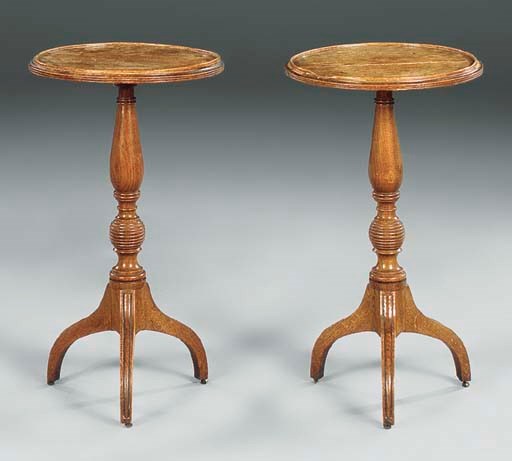 A PAIR OF REGENCY OAK CIRCULAR OCCASIONAL TABLES