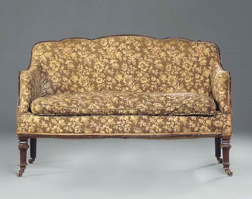 A LATE VICTORIAN MAHOGANY SOFA