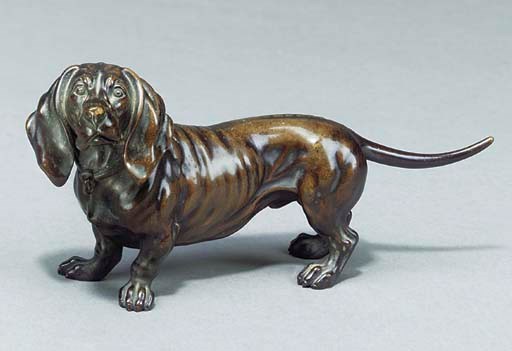 A CONTINENTAL BRONZE MODEL OF A DACHSHUND