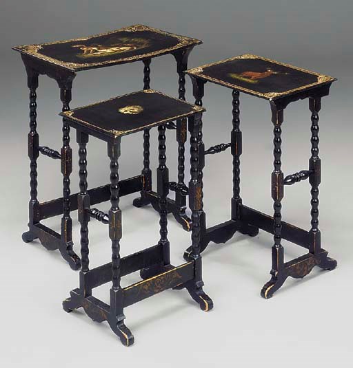 A NEST OF THREE VICTORIAN BLACK AND GILT-JAPANNED AND POLYCHROME DECORATED OCCASIONAL TABLES