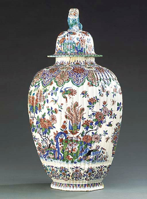 A DUTCH DELFT POLYCHROME VASE AND COVER