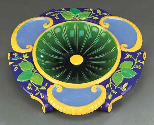 AN ENGLISH MAJOLICA JARDINIERE STAND