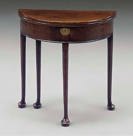 AN ENGLISH OAK DEMI-LUNE TEA TABLE
