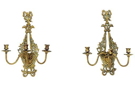 A Pair of brass three light wall appliques