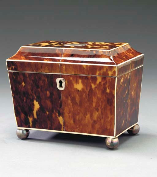 A REGENCY IVORY-INLAID AND SILVER-MOUNTED TORTOISESHELL TEA CADDY**