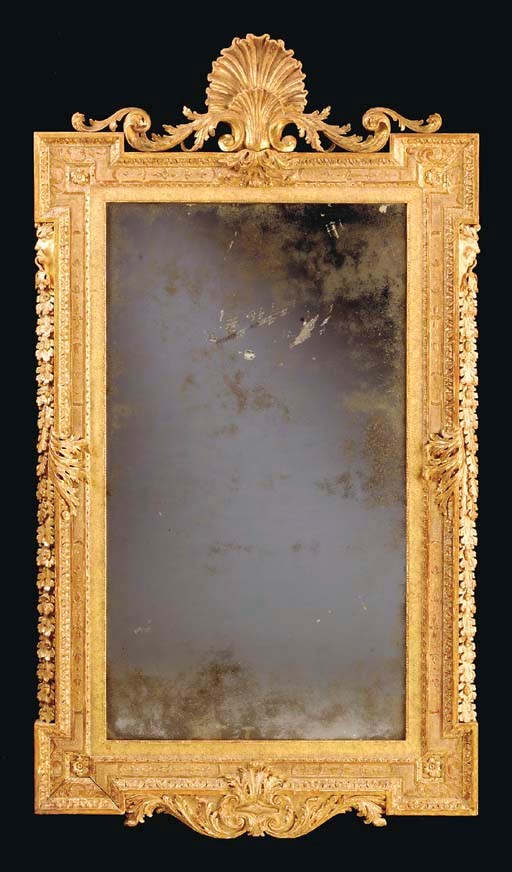 A GEORGE II GILTWOOD MIRROR