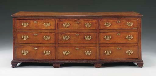A GEORGE III  OAK AND MAHOGANY DRESSER