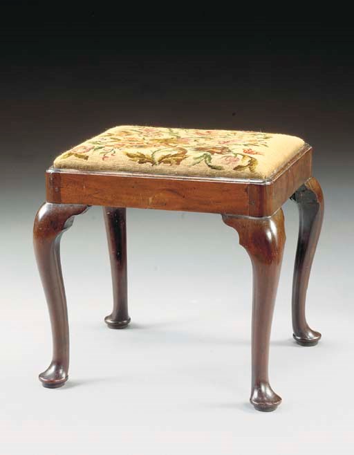 A GEORGE II MAHOGANY STOOL