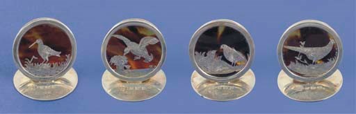A set of four silver mounted tortoiseshell menu holders