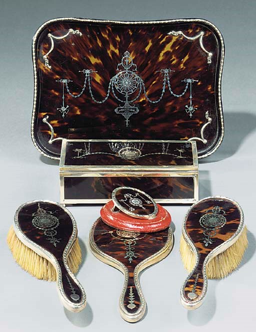 A COMPOSITE SILVER AND TORTOISESHELL DRESSING TABLE SET