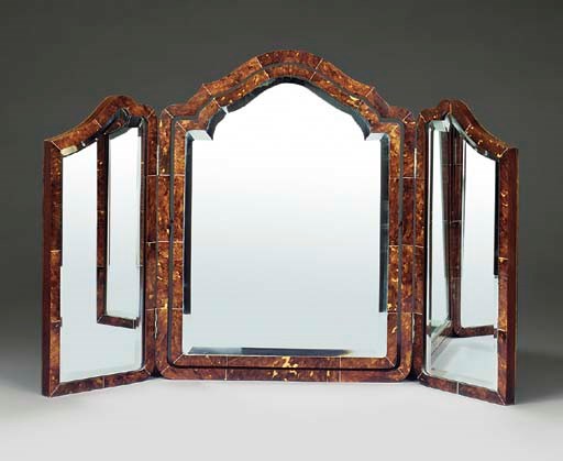 A LATE VICTORIAN OR EDWARDIAN TORTOISESHELL AND IVORY VENEERED DRESSING TABLE MIRROR