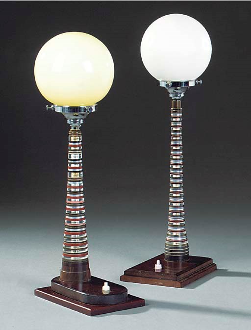 Two similar Art Deco alluminium, glass and bronze table lamps
