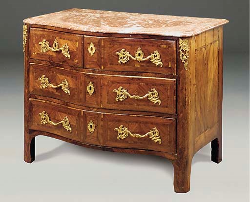 AN ORMOLU MOUNTED KINGWOOD SERPENTINE COMMODE