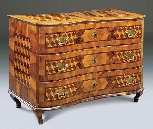 A SOUTH GERMAN WALNUT FRUITWOOD AND PARQUETRY SERPENTINE COMMODE