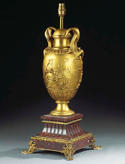 A FRENCH GILT BRONZE URN