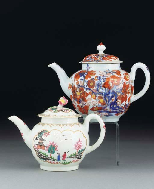 A Worcester globular teapot and cover and a blue and white fluted teapot and cover