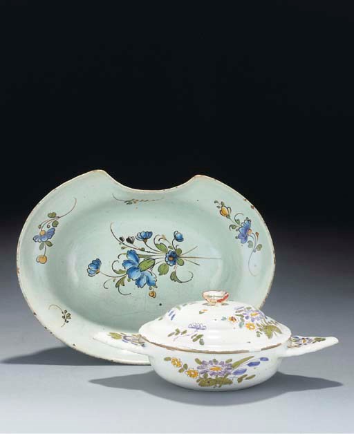 A French faience ecuelle and cover and a barber's bowl