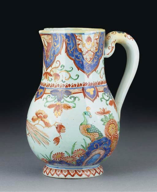 A Dutch Delft Dore pear-shaped jug