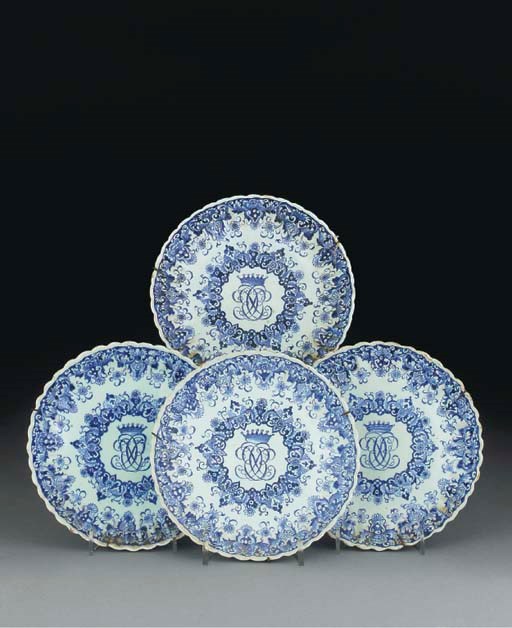 Four Dutch Delft blue and white monogrammed dishes